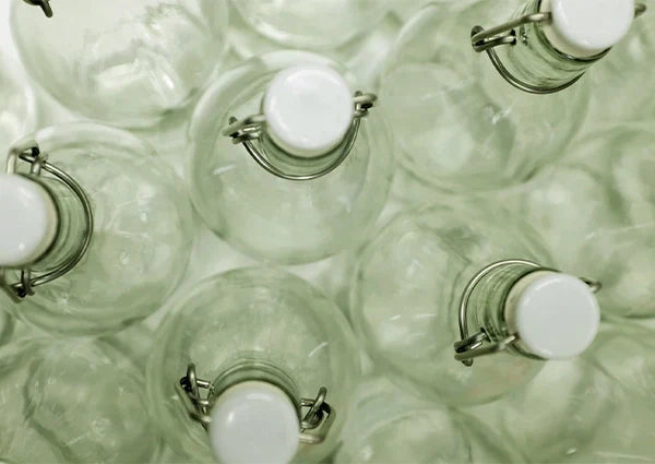 Struggling with Leaky or Low-Quality Packaging? Why Glass Bottles Solve Common Product Issues